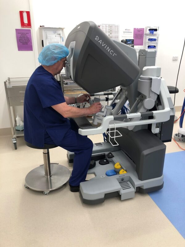 Surgeon at Da Vinci Xi robotic surgery console